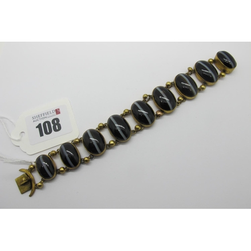 108 - A Victorian Gilt Metal and Hardstone Bracelet, of slightly graduated design, oval collet set (closed... 