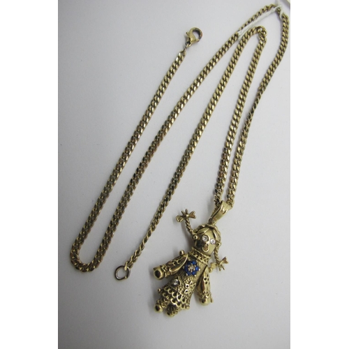 112 - A 9ct Gold Rag Doll Pendant, with inset highlights, (overall length including suspension loop 4cm) (... 