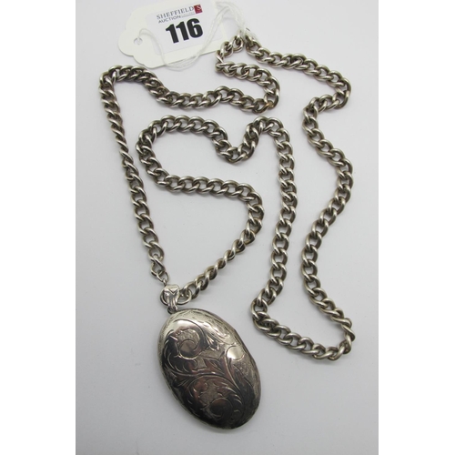 116 - A Large Oval Locket Pendant, allover leaf scroll engraved, stamped inside 