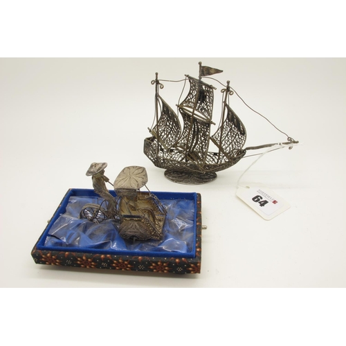 64 - A Miniature Filigree Model of A Galleon, at full sail, on oval filigree base, overall height 11.5cm;... 