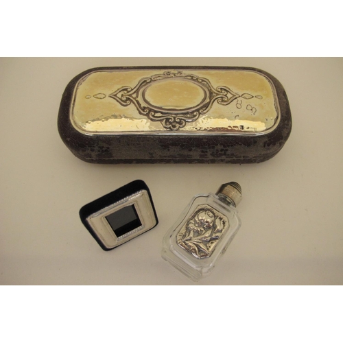 67 - A Modern Spectacles Case, (worn) the hinged lid with applied rounded rectangular hammered panel with... 