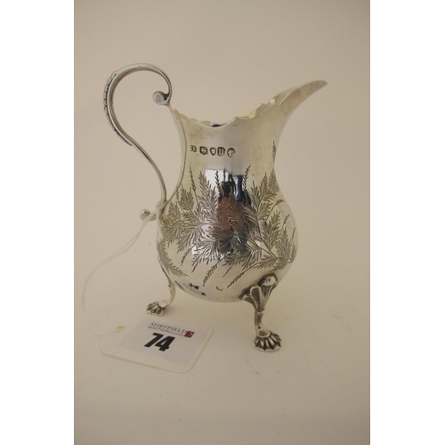 74 - A Hallmarked Silver Cream Jug, Charles Boyton, London 1875, of baluster form with engraved foliate d... 