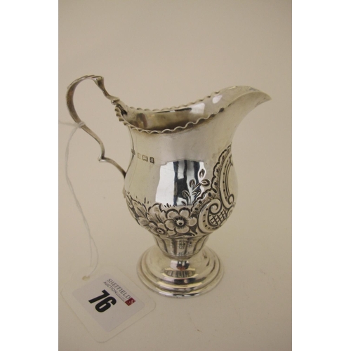 76 - A Hallmarked Silver Cream Jug, WGK, Birmingham 1903, with foliate detail, crimped edge and leaf capp... 