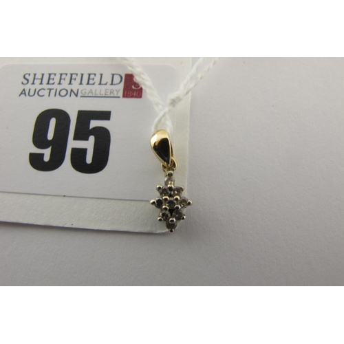 95 - A Modern 9ct Gold Cluster Pendant, claw set.