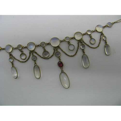 131 - An Edwardian Moonstone Festoon Style Necklace, oval and circular spectacle set, with hanging chain, ... 