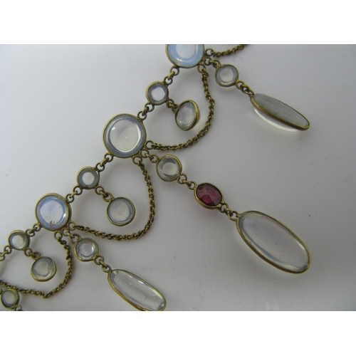 131 - An Edwardian Moonstone Festoon Style Necklace, oval and circular spectacle set, with hanging chain, ... 