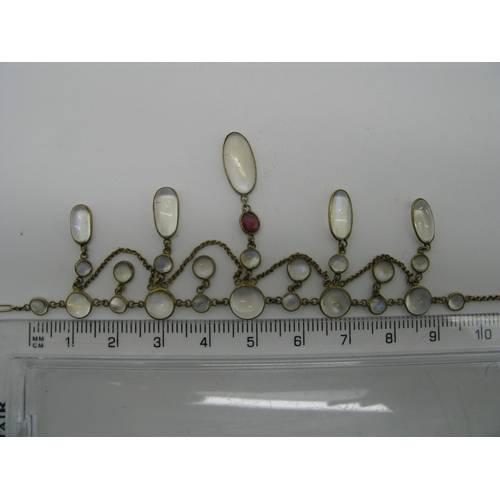 131 - An Edwardian Moonstone Festoon Style Necklace, oval and circular spectacle set, with hanging chain, ... 