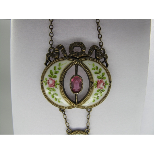 113 - An Early XX Century Gilt and Enamel Pendant, oval collet set to the centre, highlighted in pink and ... 