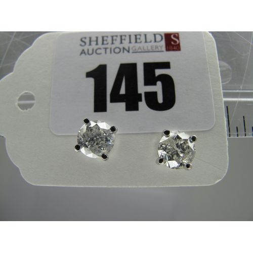 145 - A Pair of Large 18ct White Gold Single Stone Diamond Earstuds, each (6mm) brilliant cut stone four c... 
