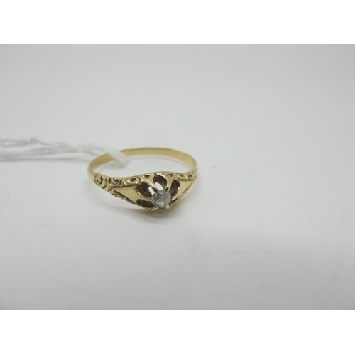 151 - A Victorian Style Single Stone Diamond Ring, the old cut stone claw set between tapering textured sh... 