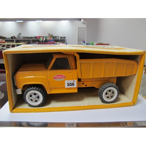 A 1970 Tonka Dump Truck 2315, in orange/yellow, very