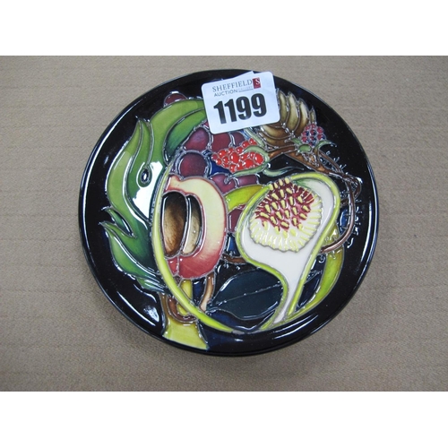 1199 - A Moorcroft Pottery Coaster, painted in the 'Queens Choice' design by Emma Bossons, shape 780/4, imp... 
