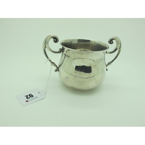 92 - A Hallmarked Silver Twin Handled Sugar Bowl, JD&S, Sheffield (date letter rubbed) of plain baluster ... 