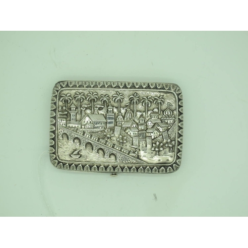 93 - A Middle Eastern Cigarette Case, of rounded rectangular form, allover detailed in relief with a wate... 