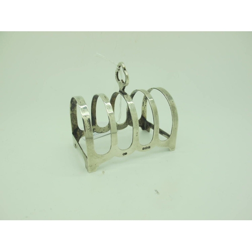 97 - A Hallmarked Silver Five Bar Toast Rack, Deakin & Francis, Birmingham 1944, of plain design with tre... 