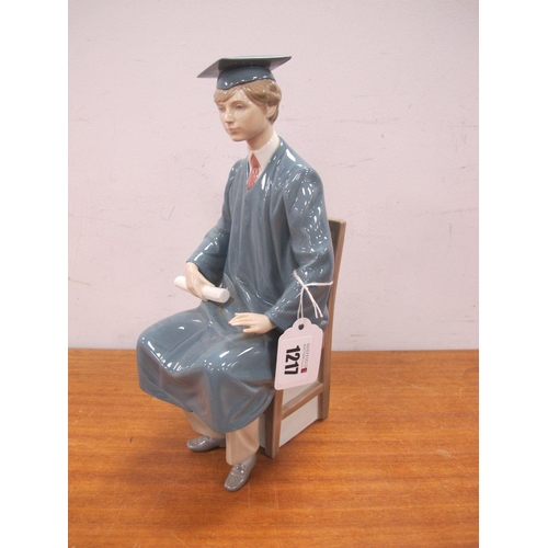 1217 - Lladro Figurine of a Seated Student, wearing a mortar board, F-26 S, 26.5cm high.