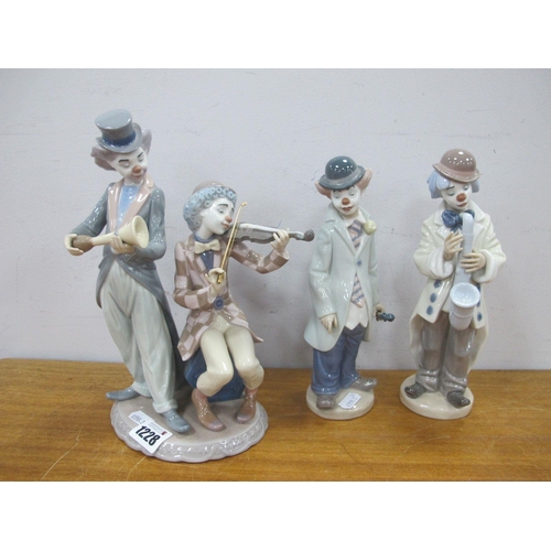 1228 - Lladro figure 'Circus Concert' with clown musicians and another. 'Sad Sax' and 'Circus Sam' (signed)... 