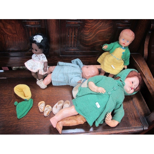 1337 - Rosebud Doll, in light blue clothing, rubber doll, larger, and black girl dolls. (4)