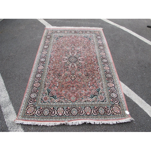 1478 - Indian Tassled Silk Rug, with all-over floral motifs in varying colours, on pink ground, 195 x 120cm... 