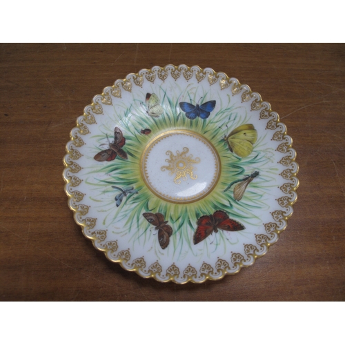 1221 - A Cabinet Cup & Saucer, circa 1900 hand painted with butterflies and moths, aesthetic gilt border.