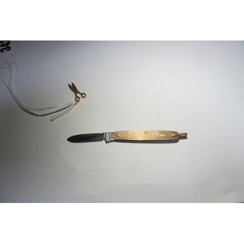 342 - A Pocket Knife, 9ct gold, London 1950, with single blade and lanyard ring, 5cm closed and a pair of ... 