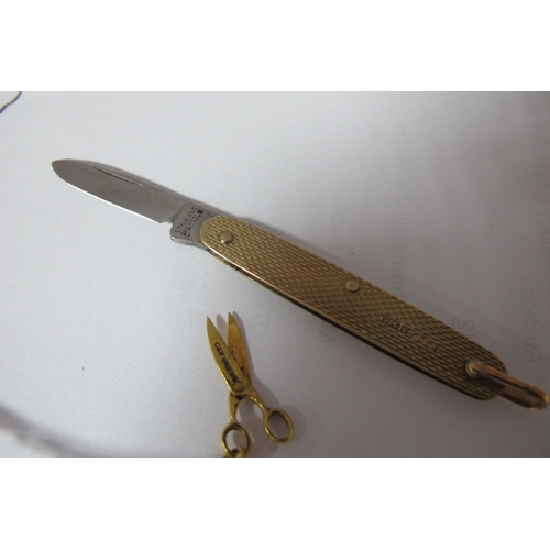 342 - A Pocket Knife, 9ct gold, London 1950, with single blade and lanyard ring, 5cm closed and a pair of ... 