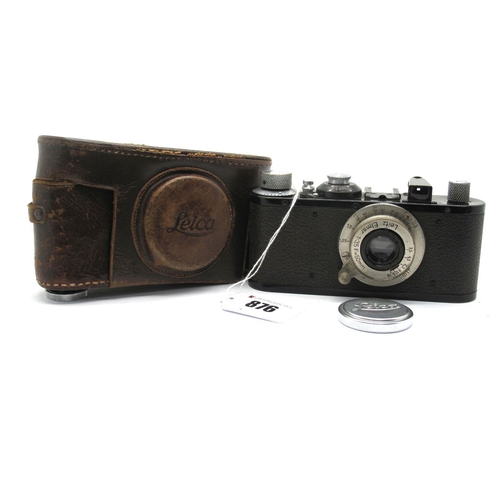 876 - Leitz Leica Camera No 253778, with Elmar 1.35 f=50mm lens, in leather case.