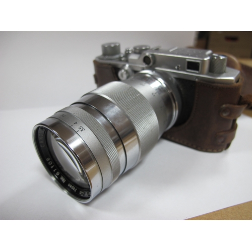 790 - Canon No. 22574, in camera holder, Canon No. 22547, in leather case, Canon Lens 135mm No. 61108, Can... 