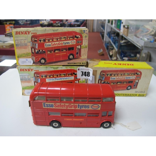 748 - Three Dinky Toys #289 Routemaster Buses, comprising of one 'Schweppes' and two 'Esso Safety Grip Tyr... 