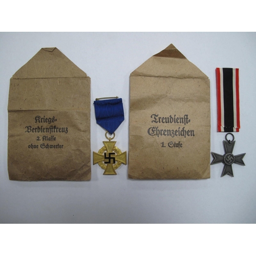 492 - WWII German War Merit Cross and Gold Forty Years Civil Service Medal, both with issue envelopes.