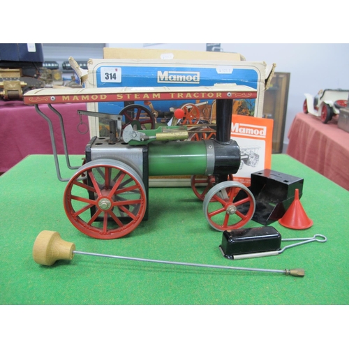 314 - A Mamod TEIA Live Steam Traction Engine, including burner, scuttle, steering rod, filler funnel, lit... 