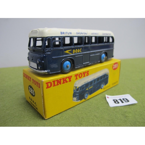 819 - A Boxed Dinky Toys #283 B.O.A.C Coach, dark blue body, off white roof (age related marks), pen writi... 