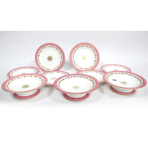 1040 - A Late XIX Century English Porcelain Dessert Service, printed and overpainted with pink roses, centr... 
