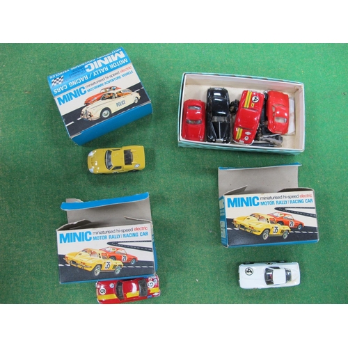 464 - Three Minic Racing Cars, boxed, Ref No's M1576 (Ferrari), M1574 (Chevy Corvette) and M1587 (Ford GT ... 