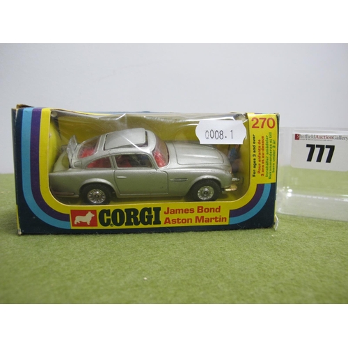 777 - A Corgi Toys No 270 Diecast Model James Bond Aston Martin, two Bandit figures present, slight crushi... 