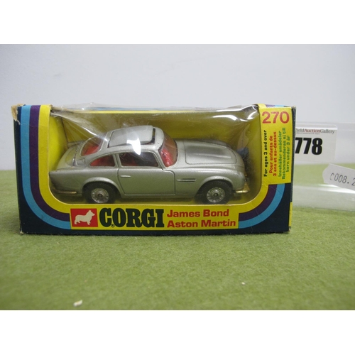 778 - A Corgi Toys No 270 Diecast Model James Bond Aston Martin, two Bandit figures present, slight crushi... 