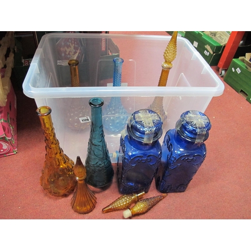 1120 - Italian Tall Glass Storage Bottles with Stoppers, of varying colours, tallest 56cm. (8)