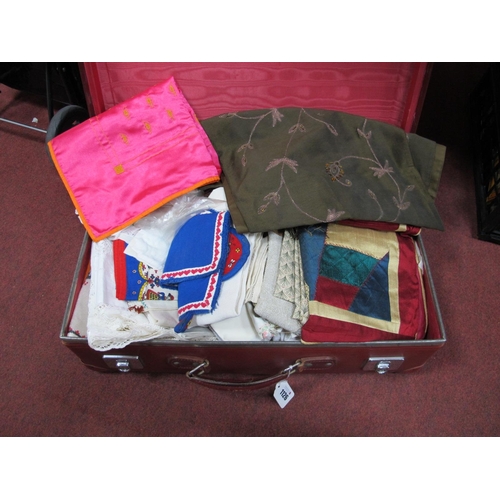 1126 - Linens, embroidery, crochet ware, Paoletti, Beethoven runner, etc, globe trotter trunk.