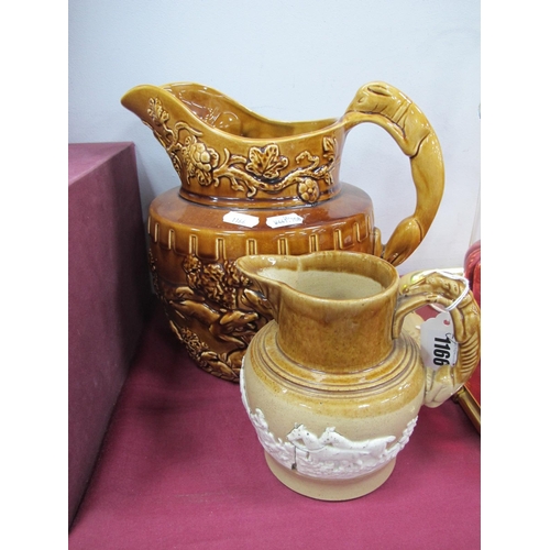 1166 - Arthur Wood Hound Handle Jug, 23cm high, smaller stoneware jug similar. (2).