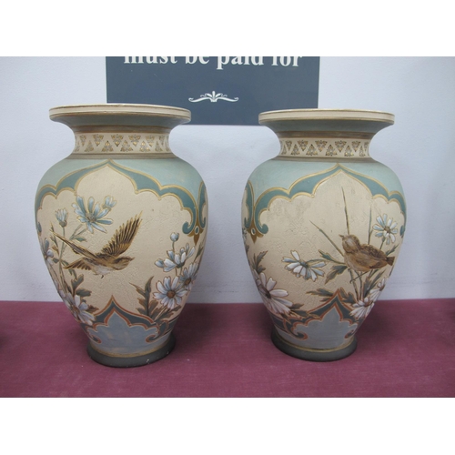 1171 - A Pair of Doulton Lambeth Silicon Vases, each decorated with bird in flight and branch, on chine gro... 