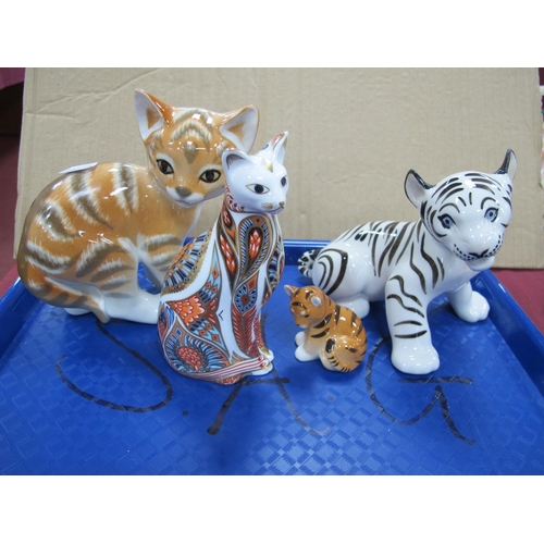 1215 - Crown Derby Paperweight of 'Siamese Cat', 13cm high (no stopper), three USSR baby cats. (4).