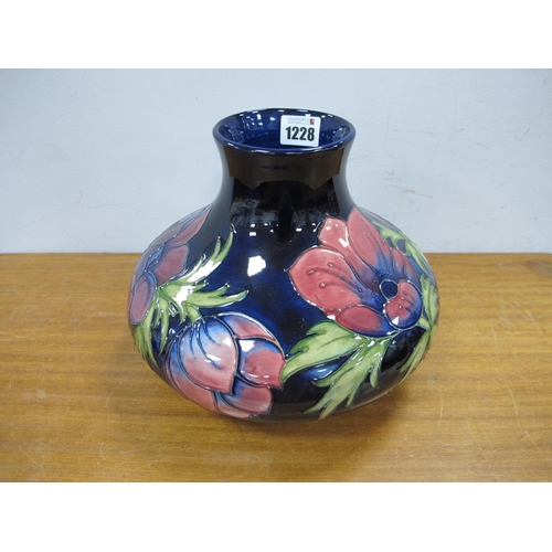 1228 - A Moorcroft Pottery Vase, of squat globular compressed form, painted in the Anemone pattern against ... 