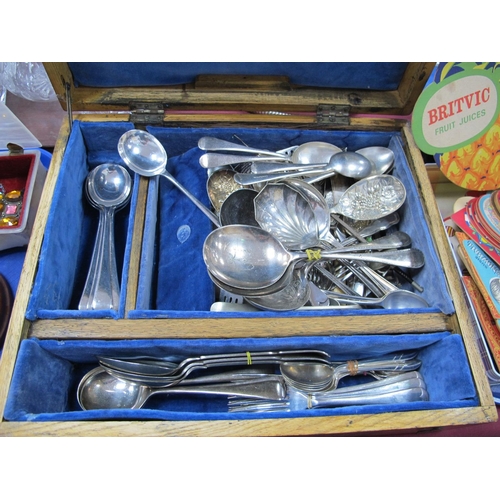 1287 - Plated Table Spoons, tea spoons, etc other loose cutlery in an oak box.