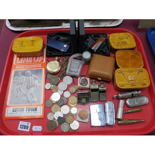 1289 - Lighters, coinage, Acme whistles, small boxes, badges, watch, etc:- One Tray.