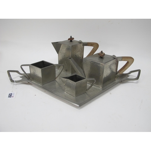 1297 - Gladwin Ltd, Sheffield 4584 Art Deco Style Pewter Four Piece Tea-Coffee Service, on lozenge shaped t... 