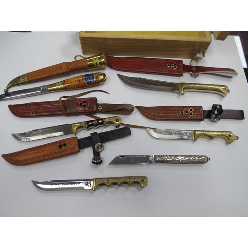 1312 - A Quantity of Asian Style Bowie Knives, all with sheaths, with ornate brass handles, some jeweled, p... 