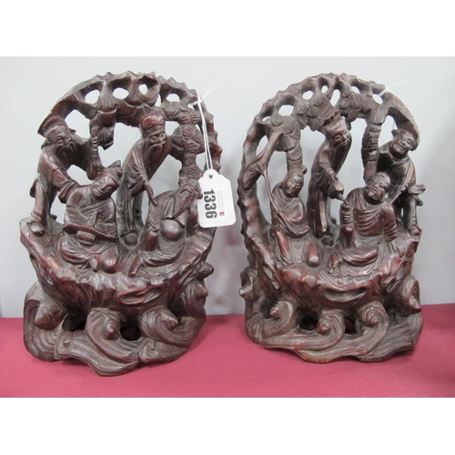 1336 - Oriental - Two Chinese Hardwood Carvings, each featuring four figures, on scroll base, 22cm high.(2)... 