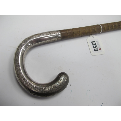 1353 - Walking Cane, circa 1900, with ribbed body and engraved silver crook handle.