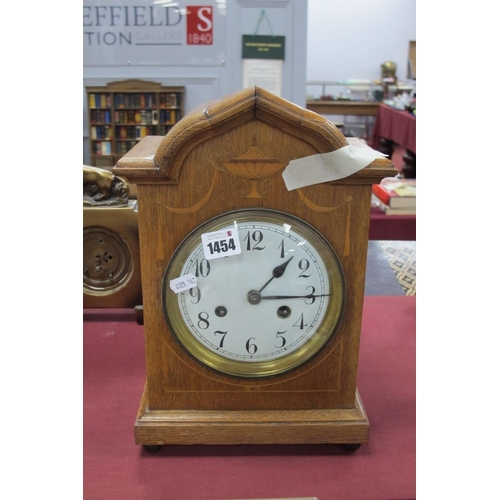 1454 - An Edwardian Inlaid Oak Cased Mantle Clock with Junghans eight day movement, 34cm high.