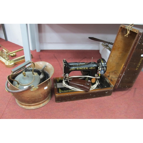 1472 - A Singer Sewing Machine, converted to electricity, XIX Century copper kettle, coal helmet. (3).